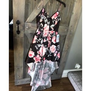 Brand new. NWT. High low dress